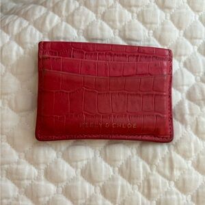 Neely and Chloe card holder in pink crocodile gently used!